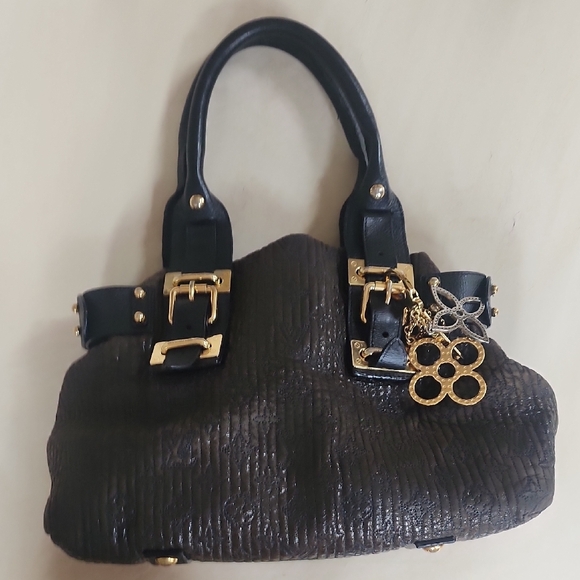 Louis Vuitton Motard Bike bag year 2007 Elegant Black Handbag with Gold Accents - Picture 10 of 10